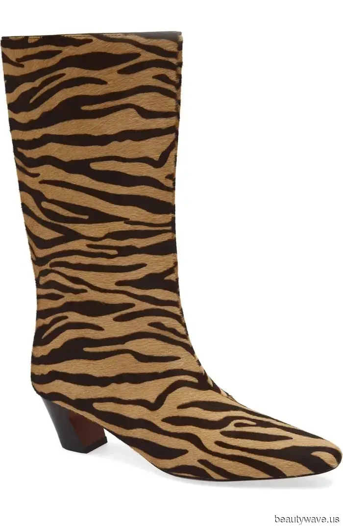 Move Over, Riding Boots—Recently, I've Been Reaching for This Flat Boot Trend More Frequently.