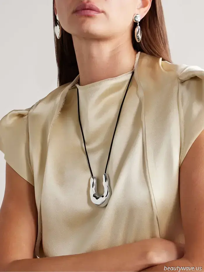 What if I told you that my necklace isn't from The Row, but rather a $38 bag charm?