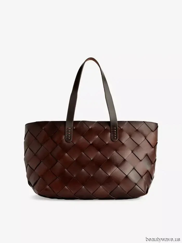 If you’re purchasing a woven bag this summer, opt for this sophisticated, classic design.