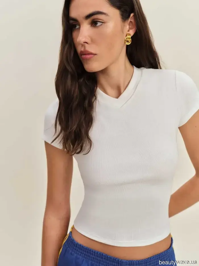 All the trendy girls are now pairing this "outdated" basic with jeans.