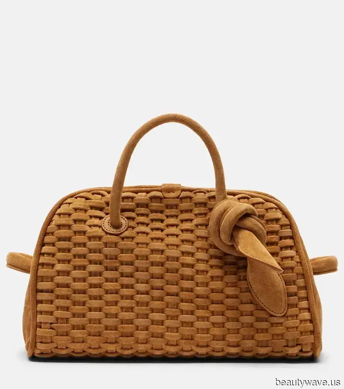 This single addition to my designer handbag collection has enhanced my style throughout the year.