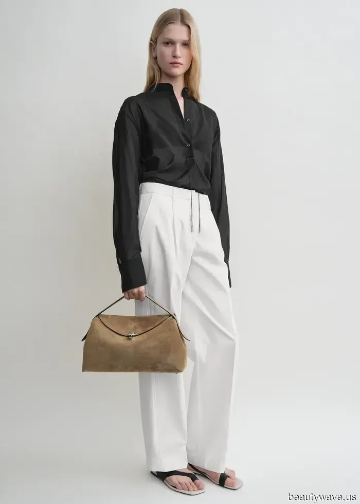 If you're holding this sophisticated handbag style, it shows you have a classic sense of fashion.