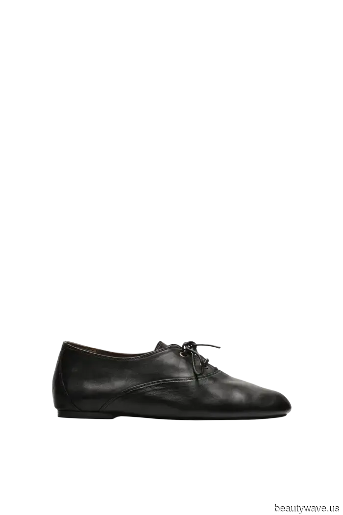 Forget the trainers—this stylish flat shoe enhances any airport attire.