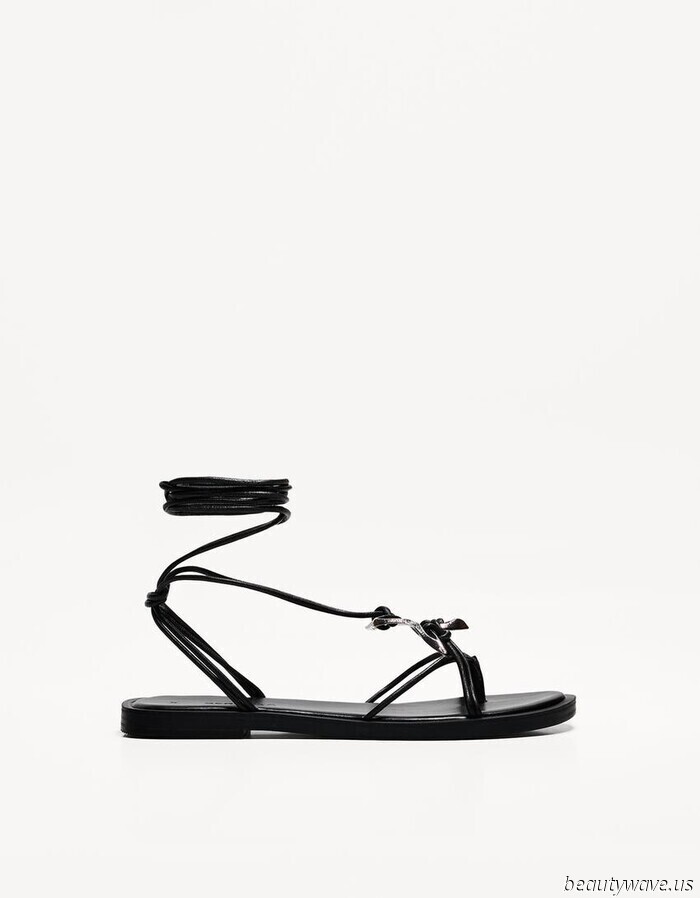 Skip the flip-flops—these attractive flat sandals elevate the style of white skirts significantly.