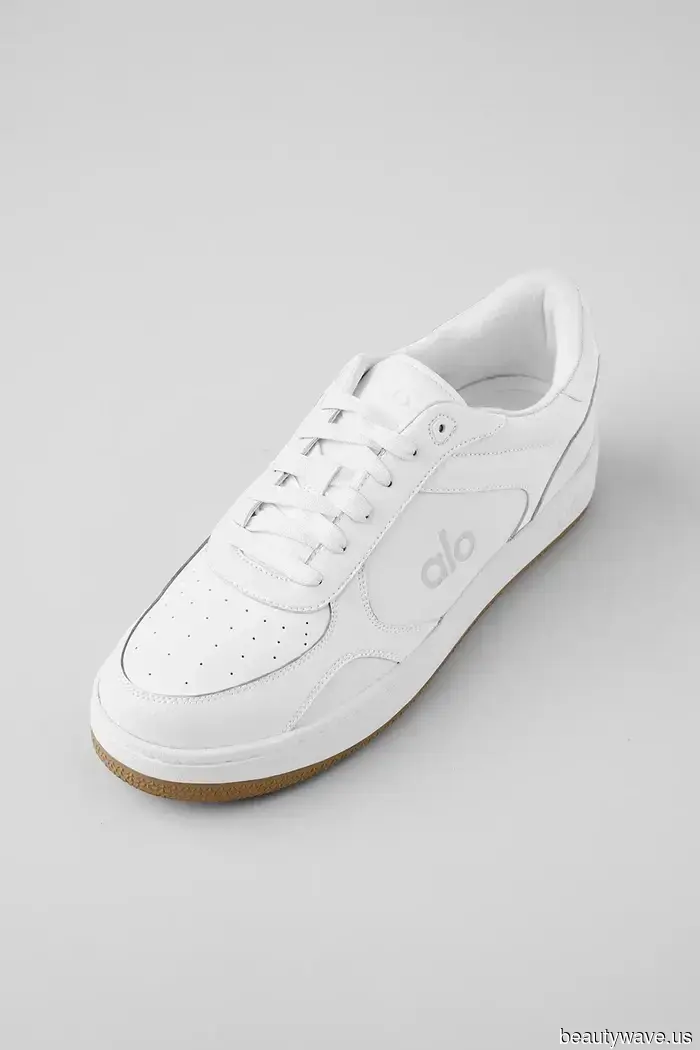 Fashion enthusiasts continue to sport white sneakers—albeit with this pant trend rather than jeans.