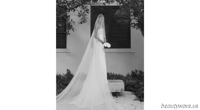 The bride donned a custom-made dress, while the groom opted for Ralph Lauren for their stunning beach wedding in the Caribbean.