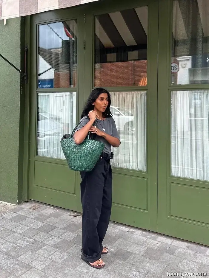 If you’re purchasing a woven bag this summer, opt for this sophisticated, classic design.