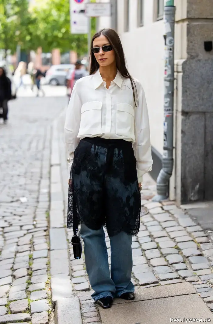 Scandi girls in Copenhagen showcased this debated layering trend with jeans during Fashion Week.