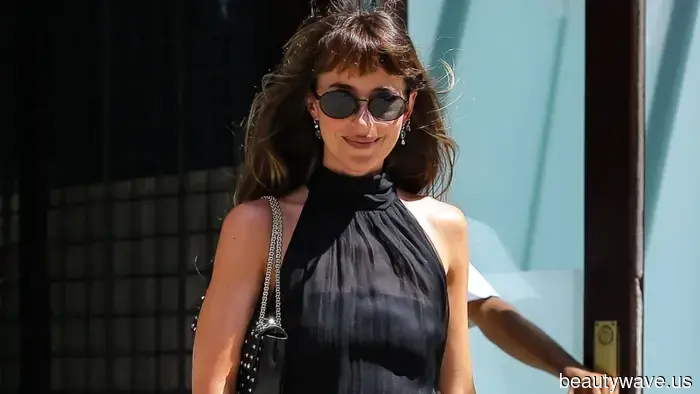 Seen on the way to Taylor Swift's wedding: Dakota Johnson wearing the most sophisticated little black dress trend of 2026.