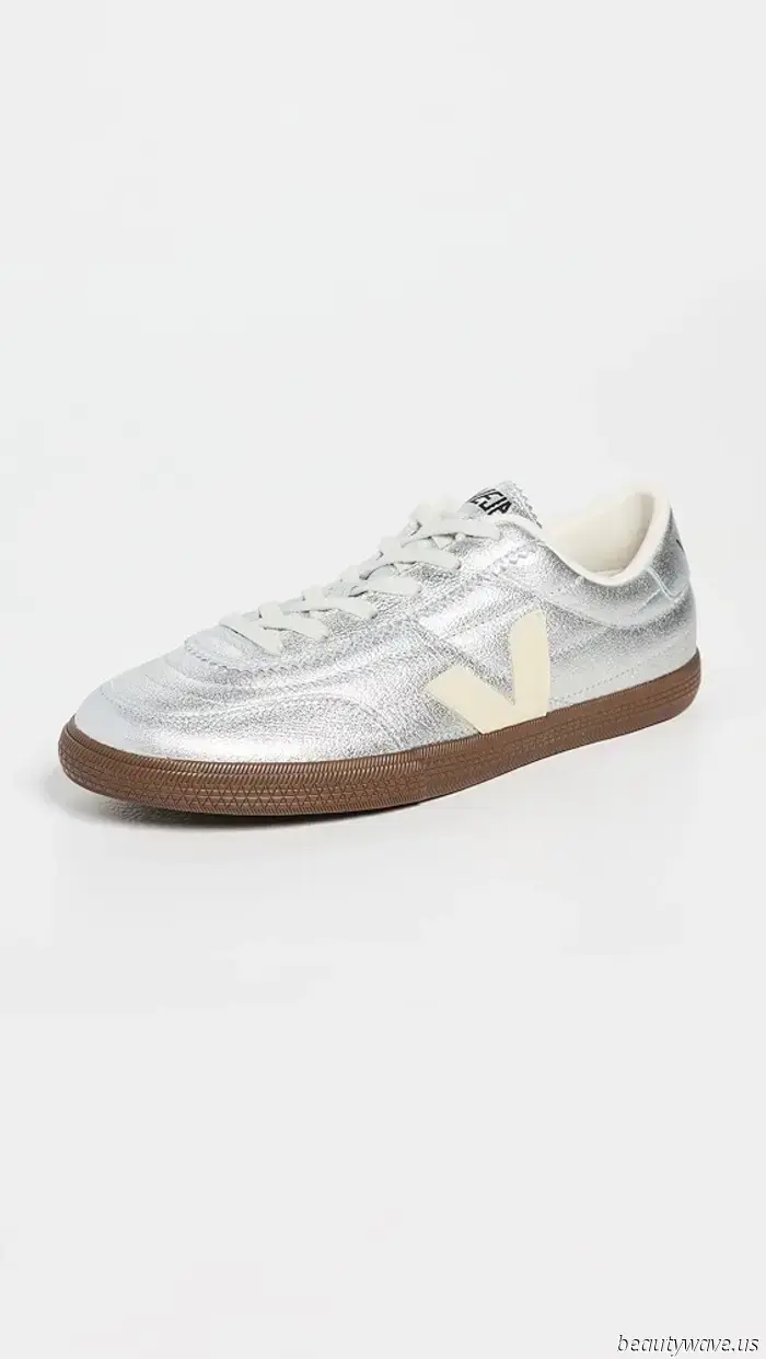 Not Black, Not White: The 2025 Sneaker Color Trend That Fashion Enthusiasts Are Currently Sporting at the Airport.