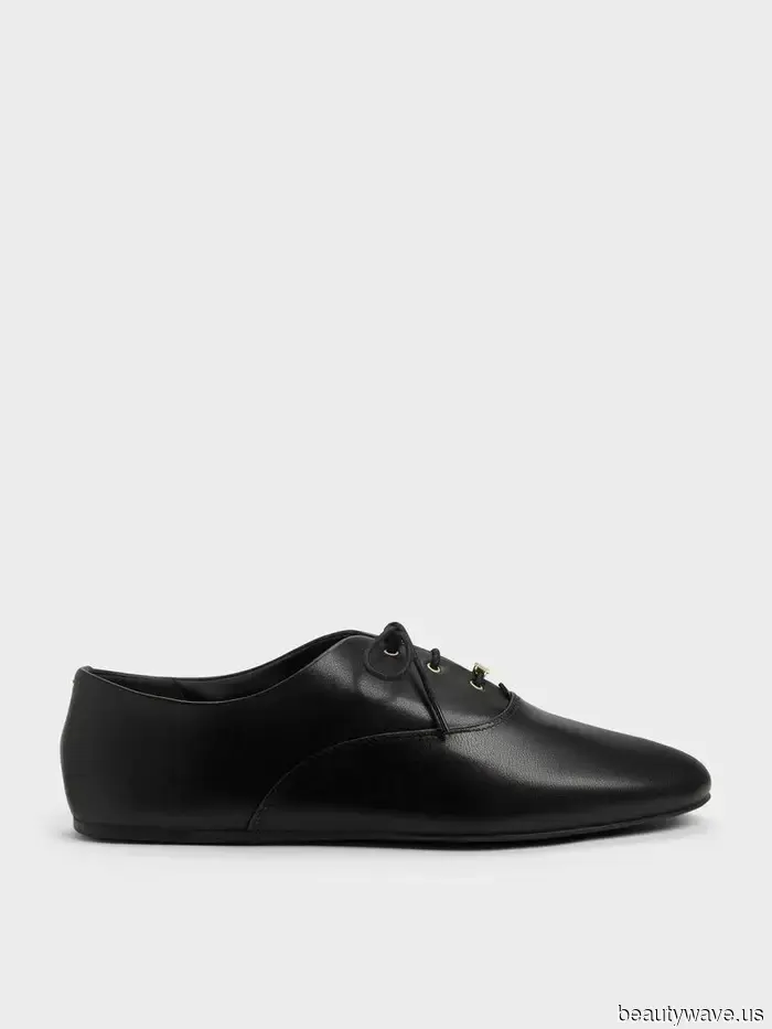 Forget the trainers—this stylish flat shoe enhances any airport attire.