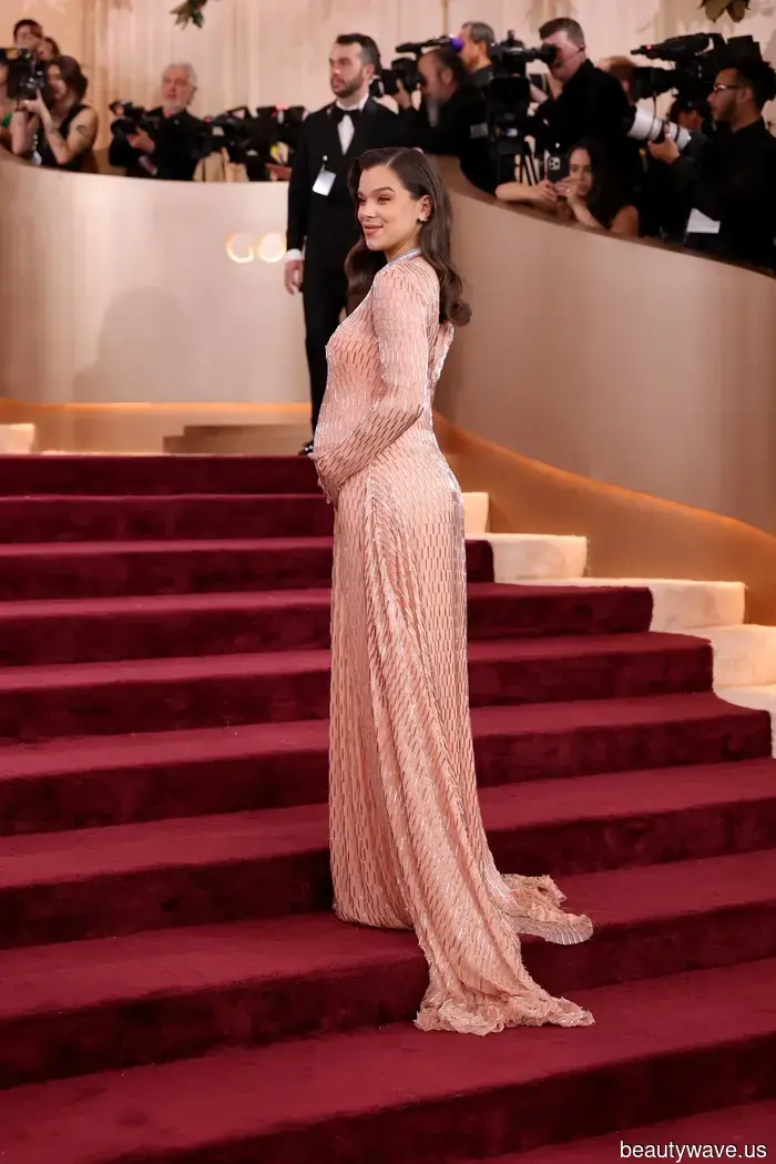 Hailee Steinfeld Just Showcased Her Baby Bump at the Golden Globes—Check Out Her Stunning Dress from All Angles.