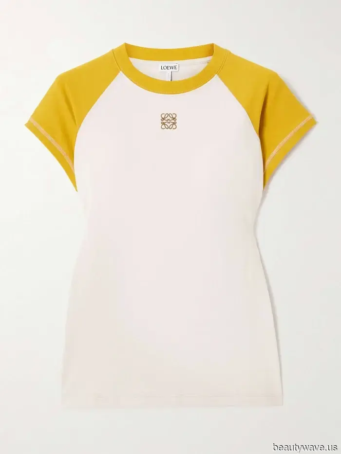 I noticed Zoë Kravitz, Hailey Bieber, and EmRata exchanging white tees for this trendy top, so I decided to follow suit.