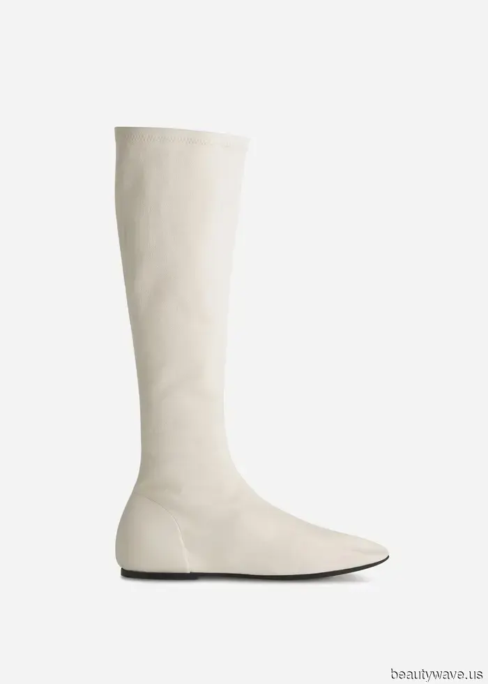 Move Over, Riding Boots—Recently, I've Been Reaching for This Flat Boot Trend More Frequently.