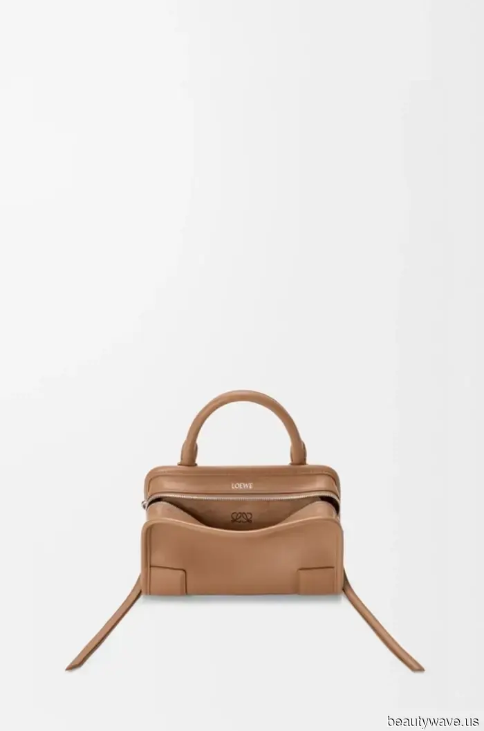 The True Display of Status in 2026 Isn't About Carrying a Birkin—It's About Wearing Your Bag Unfastened and Open.