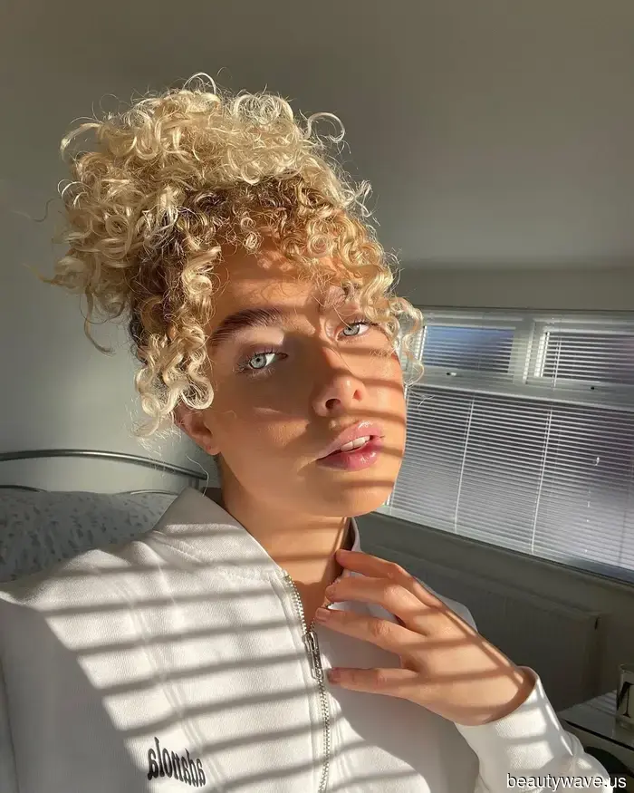 I Keep Considering Curly Bangs—Here Are 16 Styles I've Sent to My Hairstylist.