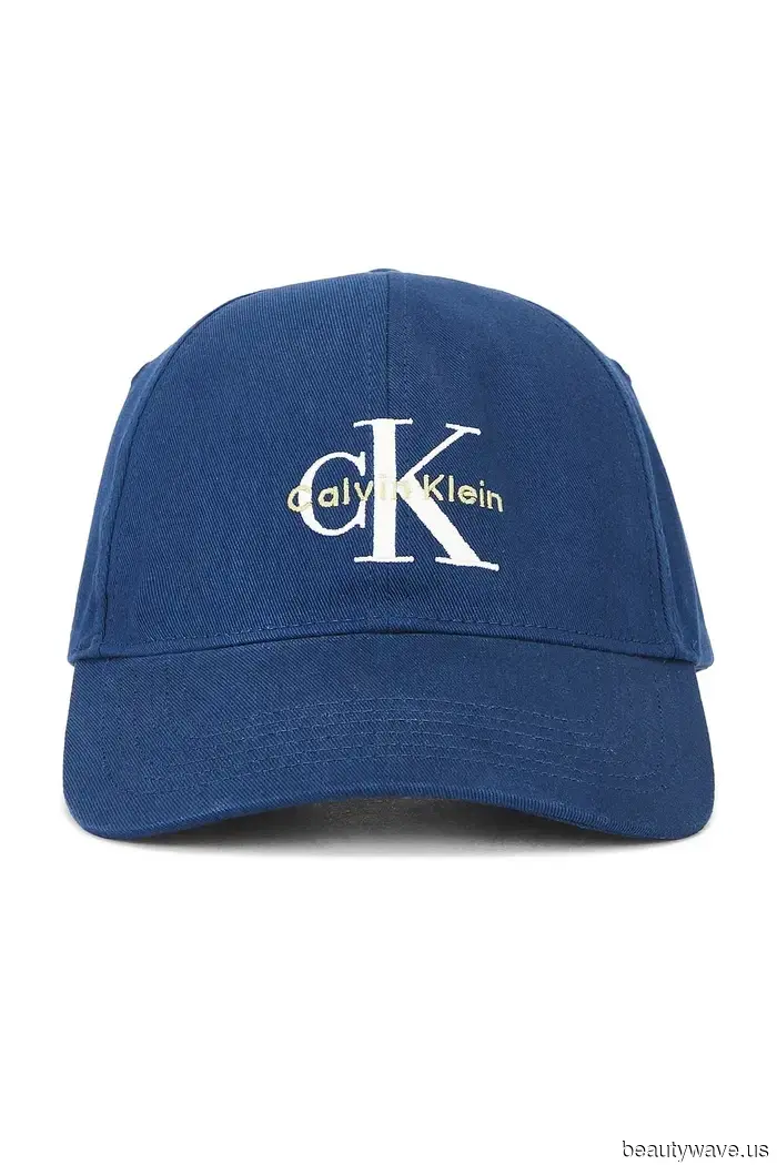 Emma Stone Discovered the Most Stylish Way to Sport a Brown Coat, Right down to Her Red Nails.