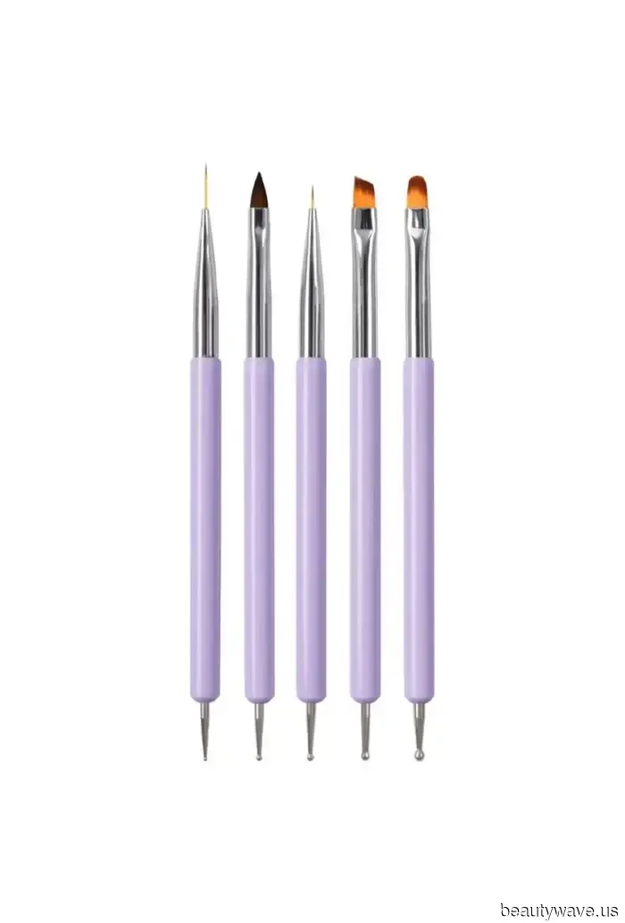 It's Official: Dua Lipa's Starry Nails Represent the Most Stylish Approach to a Festive Manicure.