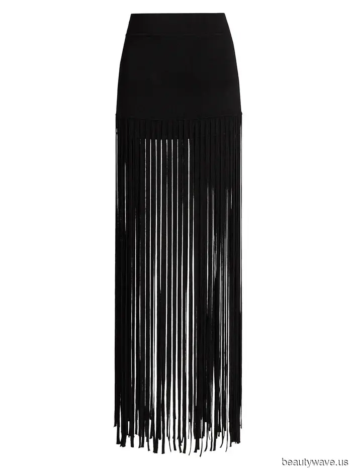 Indossare un cardigan preppy con questa tendenza controversa degli stivali lo rende dieci volte più cool.