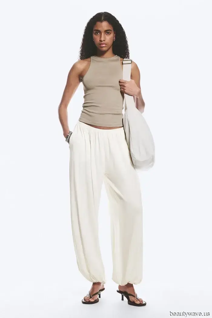 Forget the jeans—ballet flats are most stylish when paired with this season's trendy trousers.