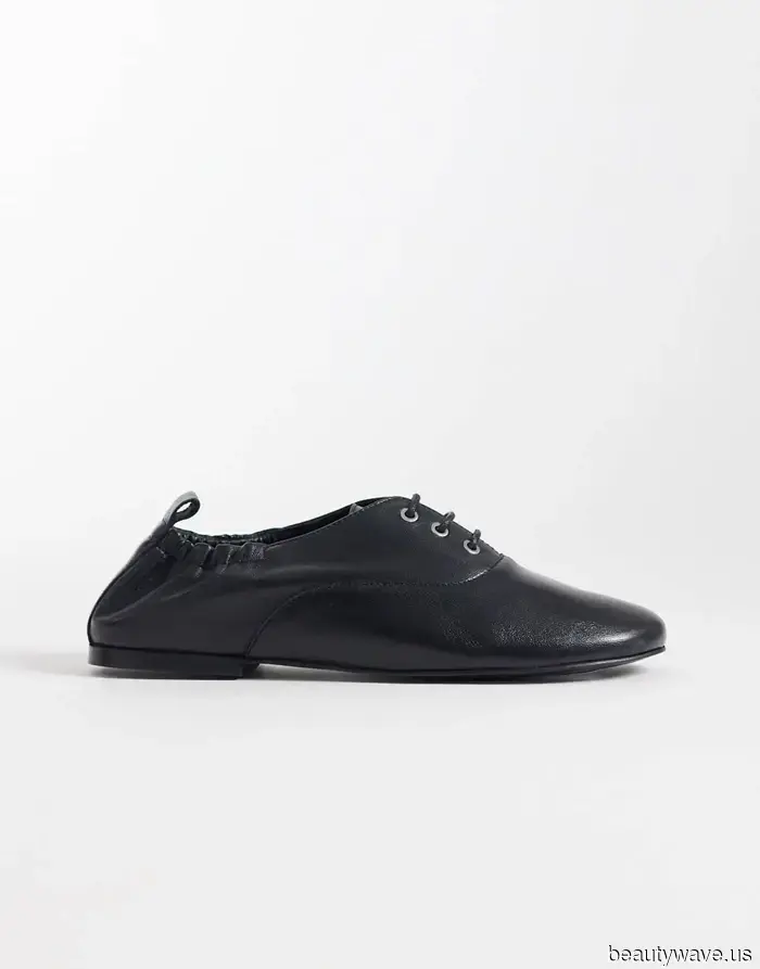 Forget the trainers—this stylish flat shoe enhances any airport attire.