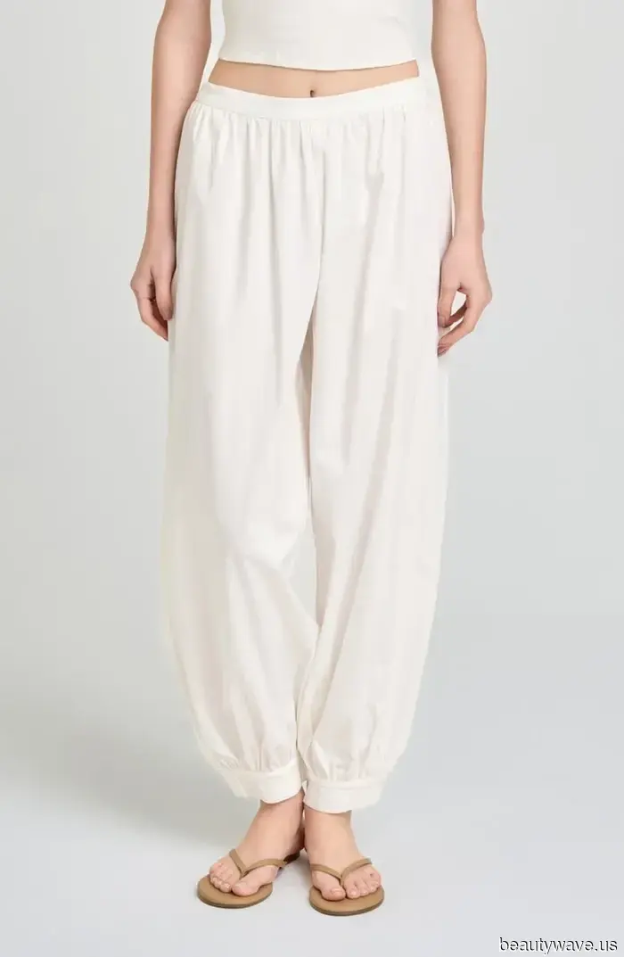 Fashion enthusiasts continue to sport white sneakers—albeit with this pant trend rather than jeans.