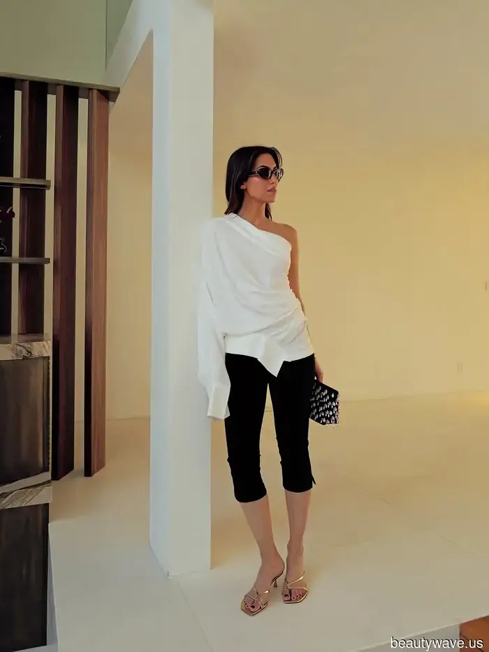 Il modo francese di abbinare i pantaloni capri neri questo autunno