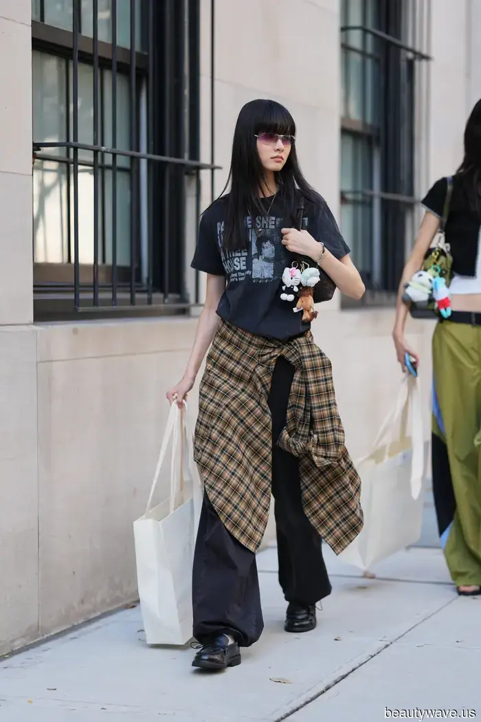 Forget Silk Scarves—Fashion Enthusiasts Everywhere Are Now Wrapping This Fall Essential Around Their Waists Instead.