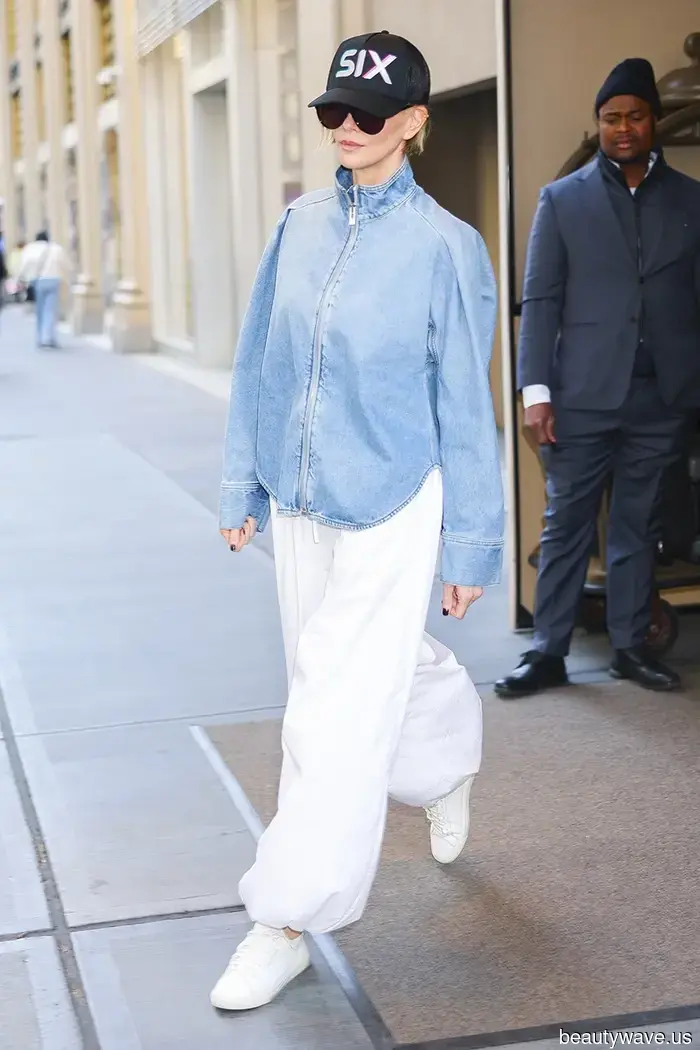 Fashion enthusiasts continue to sport white sneakers—albeit with this pant trend rather than jeans.