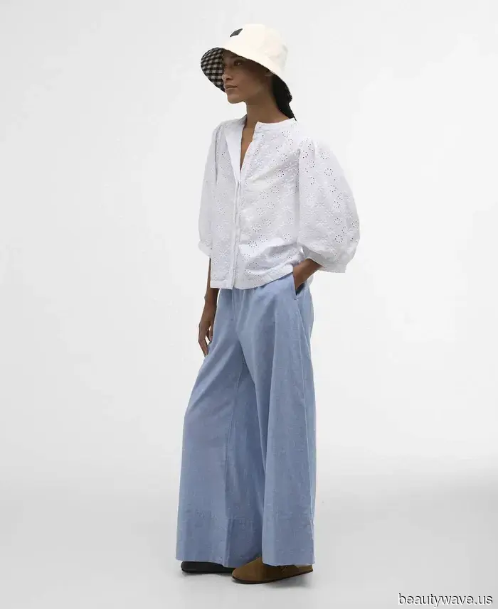 Nicht ein Tanktop, nicht ein T-Shirt: Der "veraltete" Top-Trend, den gerade jeder in der Mode mit seinen Jeans trägt.