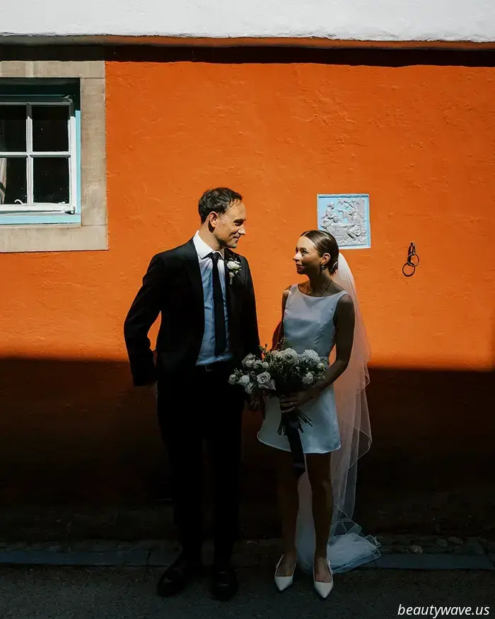 This lovely bride donned a stylish Reformation minidress for her intimate wedding in Wales, which had 26 guests.