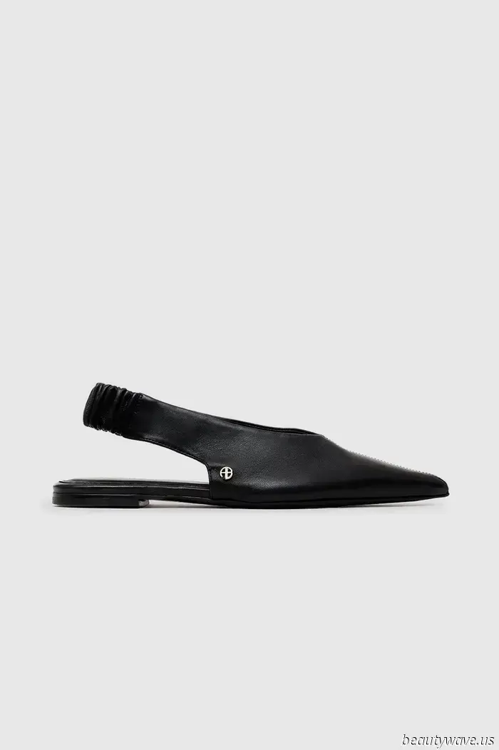 Skip the sneakers—this is the elegant flat-shoe style that French women pair with three different types of casual trousers.