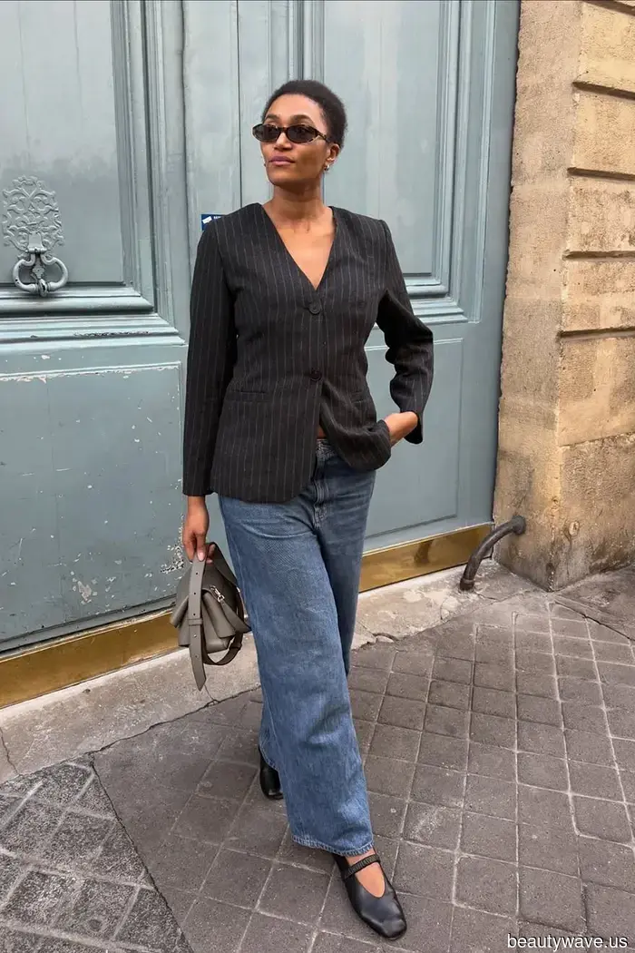To achieve a more French look, pair your black blazers with this timeless denim style.