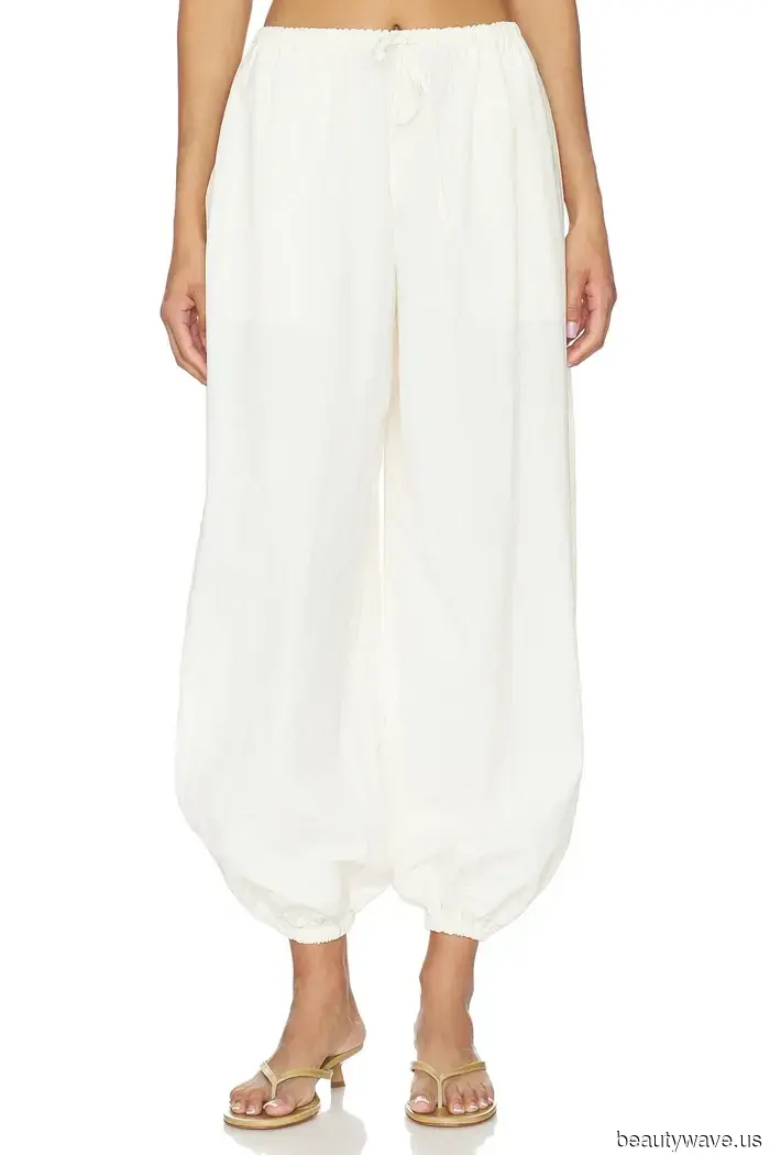 Fashion enthusiasts continue to sport white sneakers—albeit with this pant trend rather than jeans.