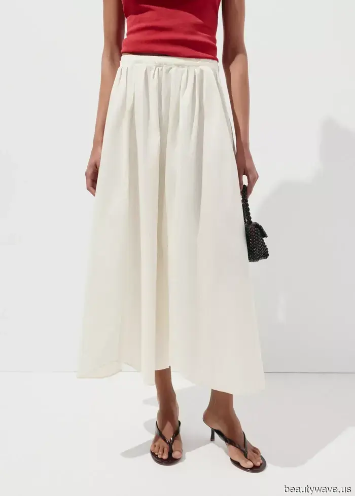 Invece dei jeans, le persone a Parigi indossano questo elegante capo con ballerine e mocassini.