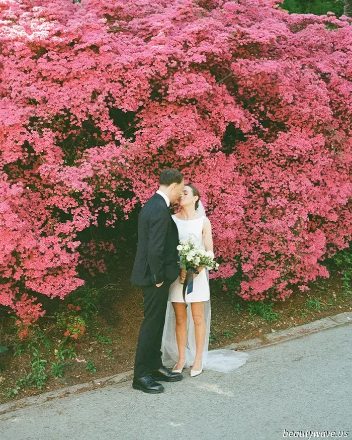 This lovely bride donned a stylish Reformation minidress for her intimate wedding in Wales, which had 26 guests.
