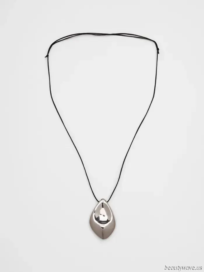 What if I told you that my necklace isn't from The Row, but rather a $38 bag charm?