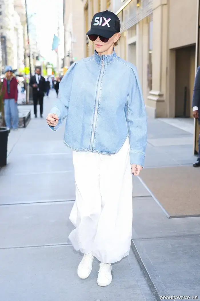 Fashion enthusiasts continue to sport white sneakers—albeit with this pant trend rather than jeans.