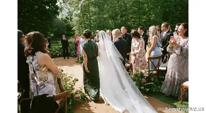 This stunning Babington House wedding featured a Brazilian welcome BBQ, a custom gown, and an adorable puppy.