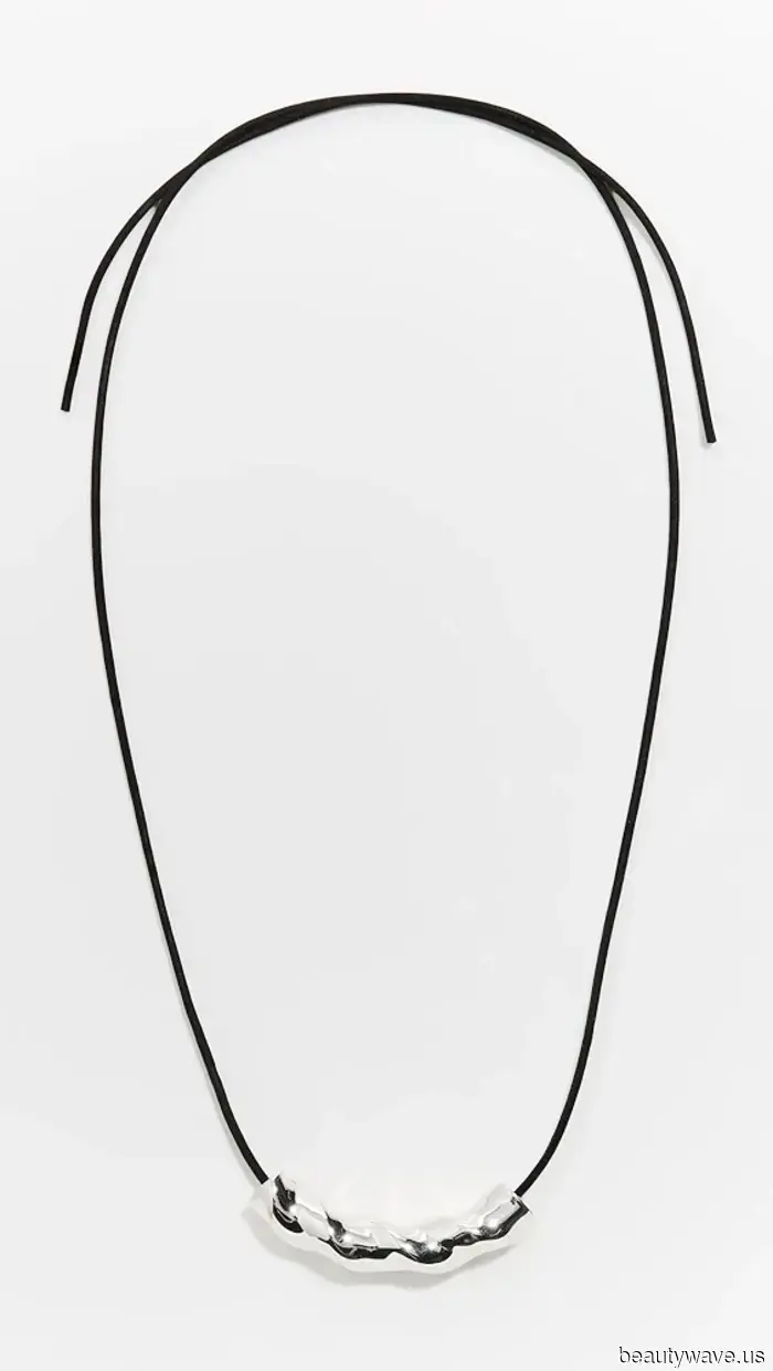 The Unexpected Jewelry Trend That People Are Pairing With Coats and Sweaters This Season