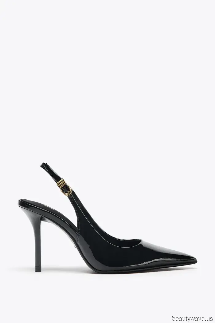 Jennifer Aniston trug gerade die '90er Schwarz-Hosen-und-Schuhe-Kombination, die zuverlässig schick ist.