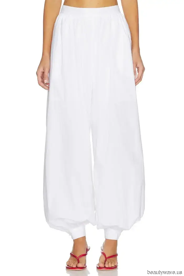 Fashion enthusiasts continue to sport white sneakers—albeit with this pant trend rather than jeans.