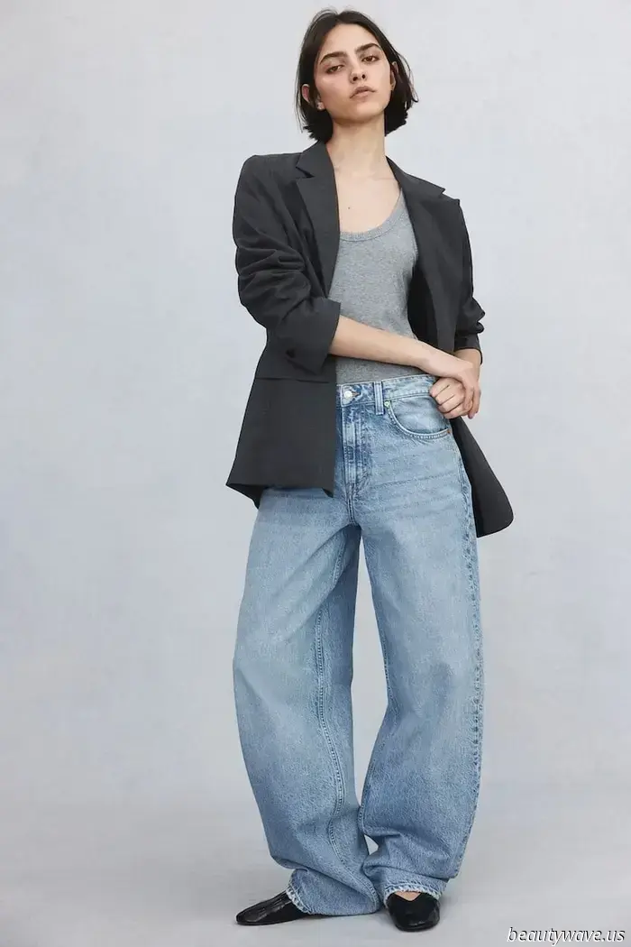 Dakota Johnson Recently Wore the Timeless Top That Effortlessly Elevates Baggy Jeans